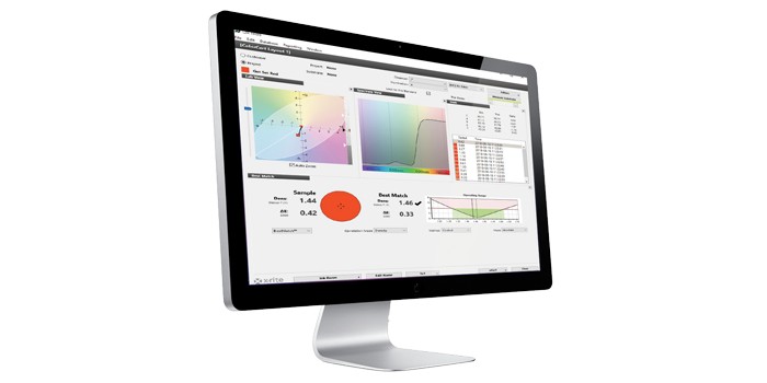 A large desktop computer showing X-Rite color analysis software ColorCert QA.
