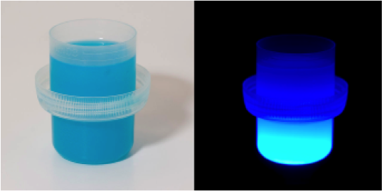 This laundry detergent contains optical brightening agents. Notice how it appears to glow under UV light? 