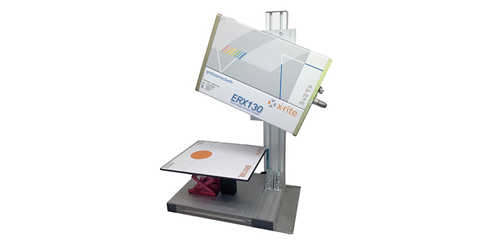 Each X-Rite inline color measurement system uses a non-contact spectrophotometer that often includes a moving frame or robotic arm to position the spectro over the production line.
